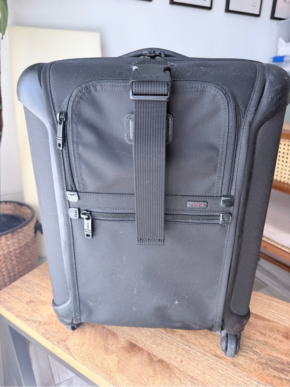 Tumi Alpha Black Carry-On Spinner with Front Strap